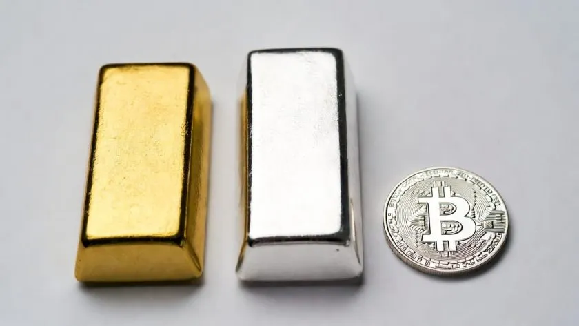 Oro y plata pierden brillo mientras Bitcoin intenta recuperar terreno frente a los metales