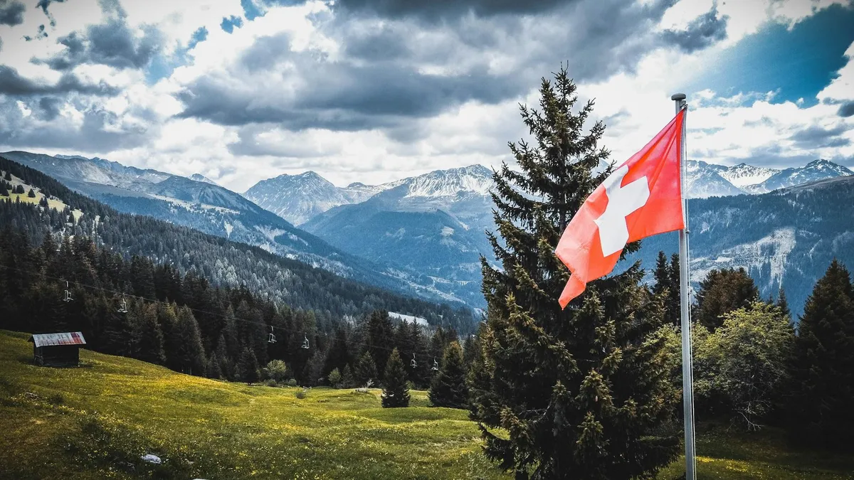 Swissquote lowers 2023 forecasts as crypto income falls in first half